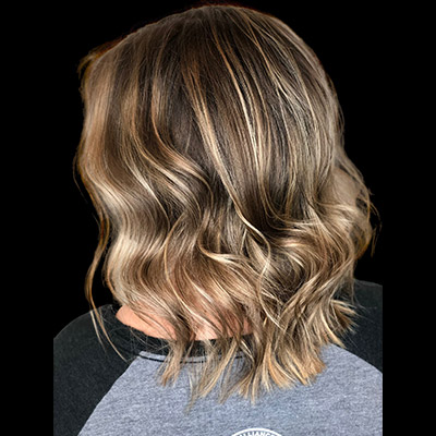 side-view-of-wavy-highlighted0hair